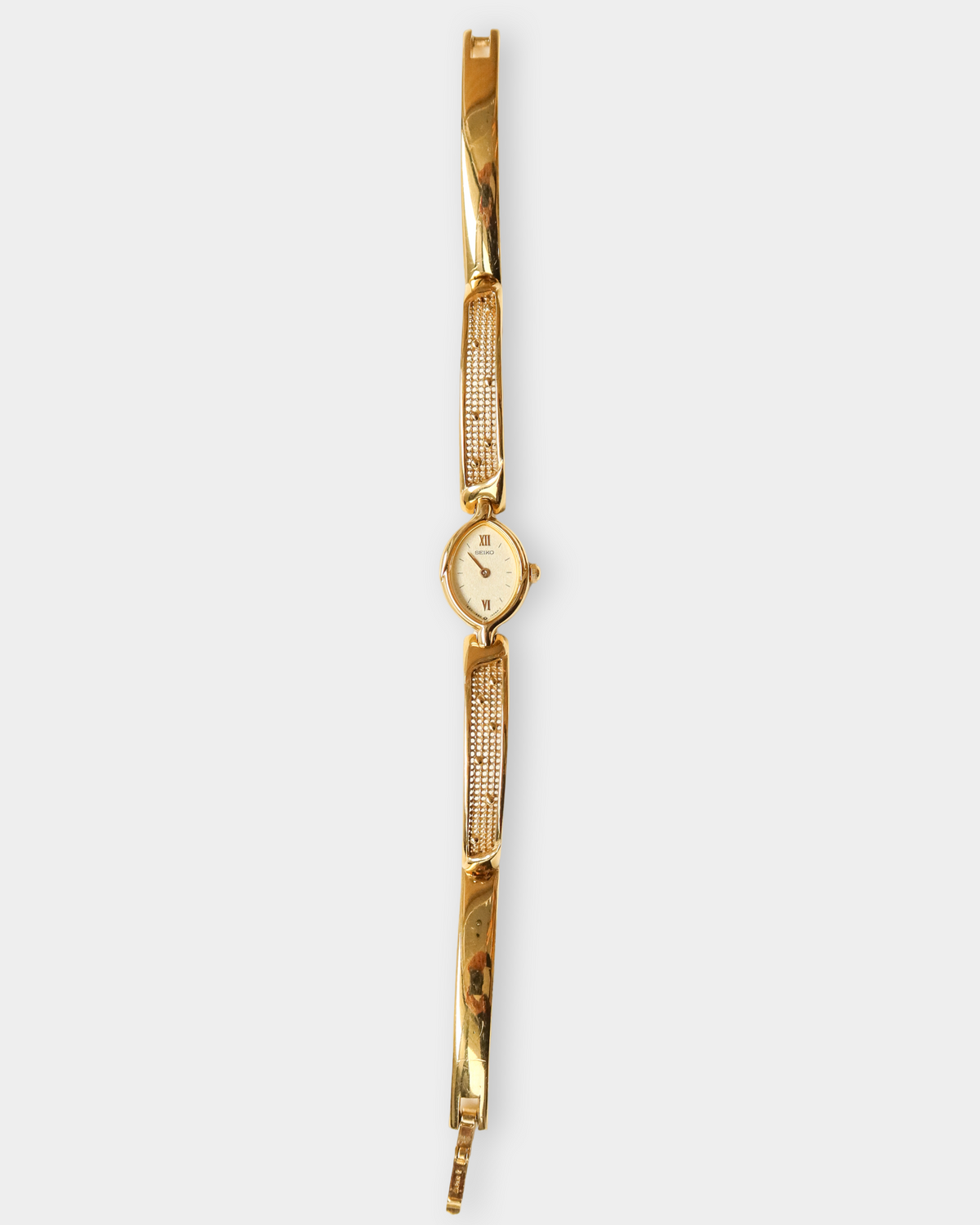 Seiko Vintage Gold-Tone Textured Oval Bracelet Watch